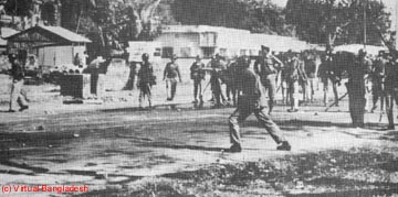 Pakistani Army engaging in random mayhem in a Dhaka slum area