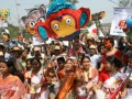 Colour full rally arranged by different cultural organization in Bogra. The first day of Bangla Year 1416. The,rally is decorated with paper made colorful mask, owl, elephant, and crocodile figures to mark 'Pohela Boishakh. Bogra, Bangladesh. April 15 2009